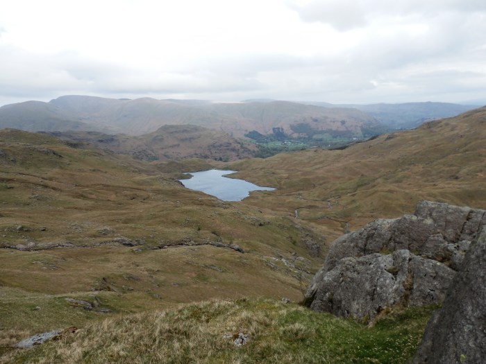 Looking down to Easedale Tarn, Helm Crag and Grasmere from Belles Knott